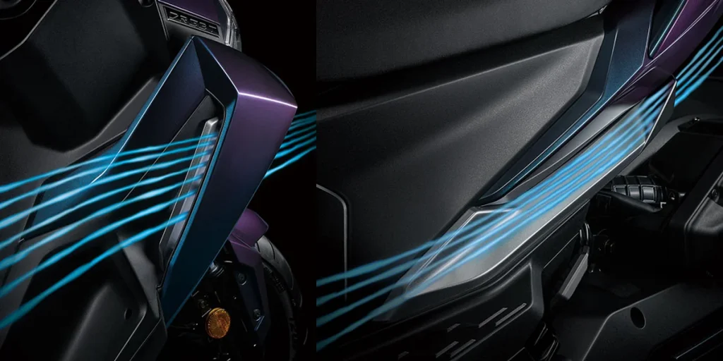 车头进气孔减少正面撞风的阻力,同时车侧扰流件将气流引导至车尾