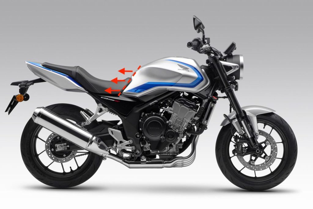 CB500SF 透過油箱後端傾斜與座墊線條的配合，產生了視覺上的長油箱效果。